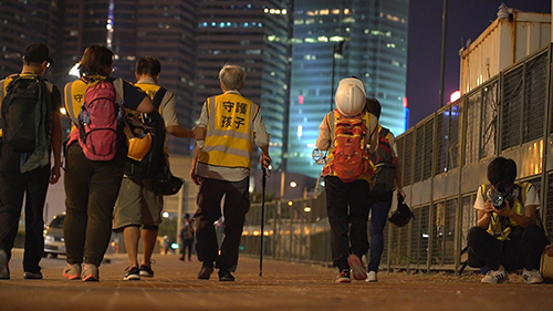 WP 59_Still_The _Thin Yellow Line_ Standing Between Hong Kong Police and Protesters_Dayu Zhang_South China Morning Post