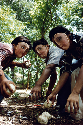 Susan Meiselas_Youths practice throwing contact bombs in forest surrounding Monimbo_Nicaragua_1978