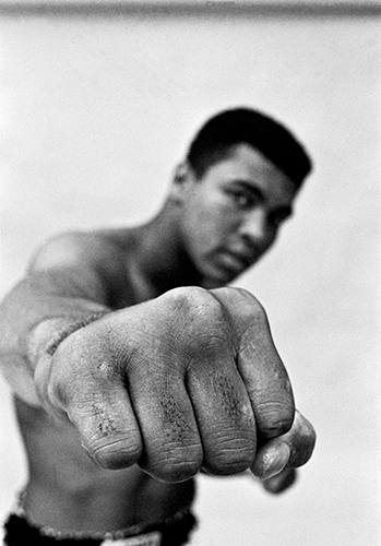 TH 1_HOT USA. Chicago 1966. MUHAMMAD ALI, boxing world heavy weight champion showing off his right fist_copyright Thomas Hoepker and Magnum Photos