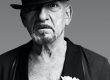 Foto Bryan Adams. Sir Ben Kingsley mit Blume,, London 2010